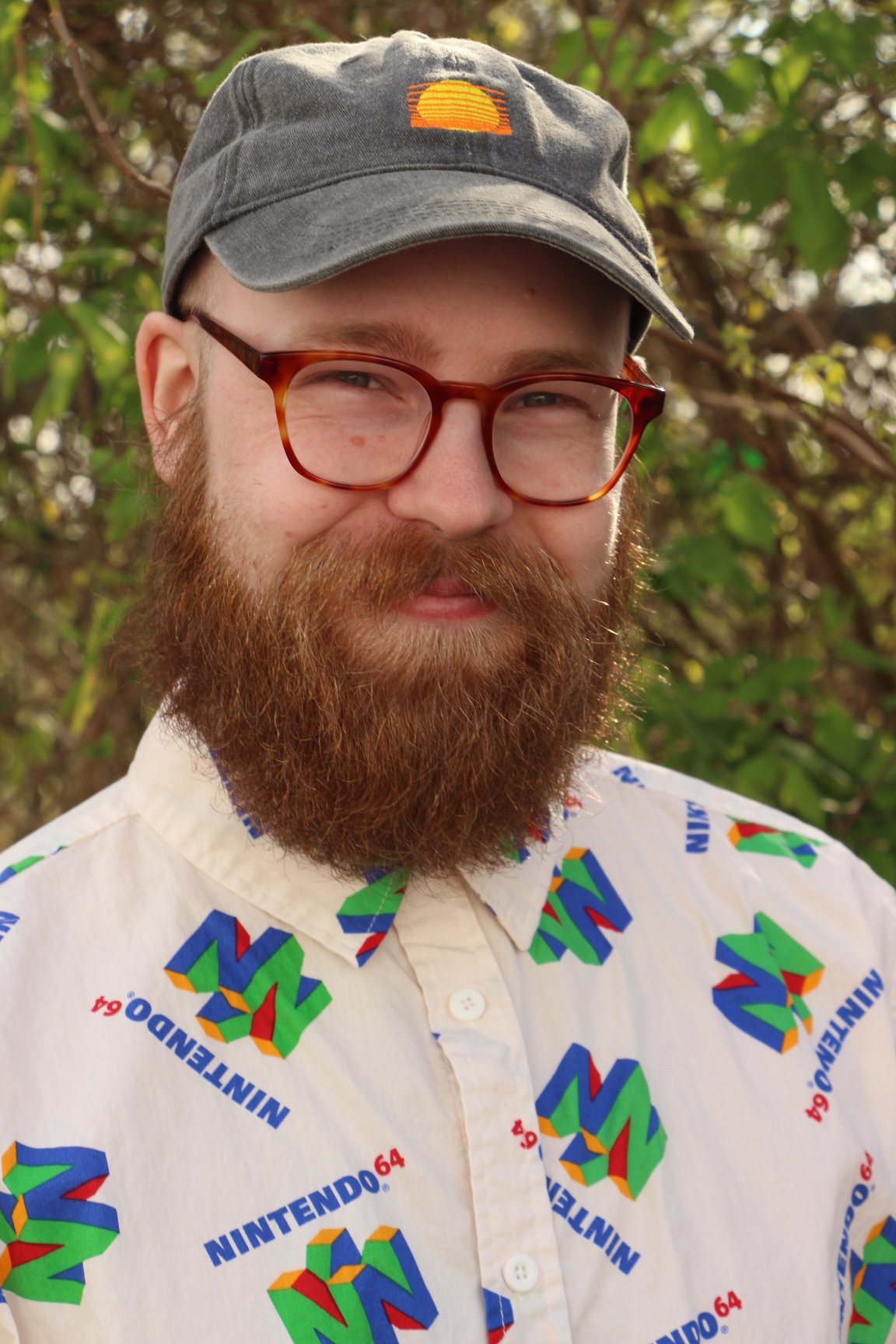 A person with a beard and hat  AI-generated content may be incorrect.
